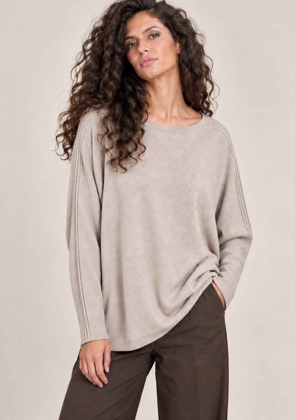Maglia bottoni dietro in colore beige