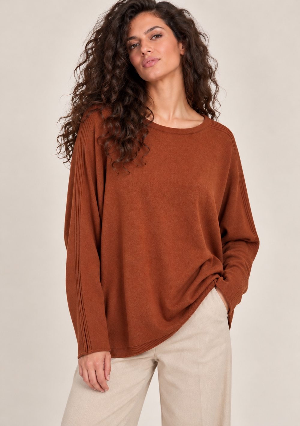 Maglia bottoni dietro in colore coccio