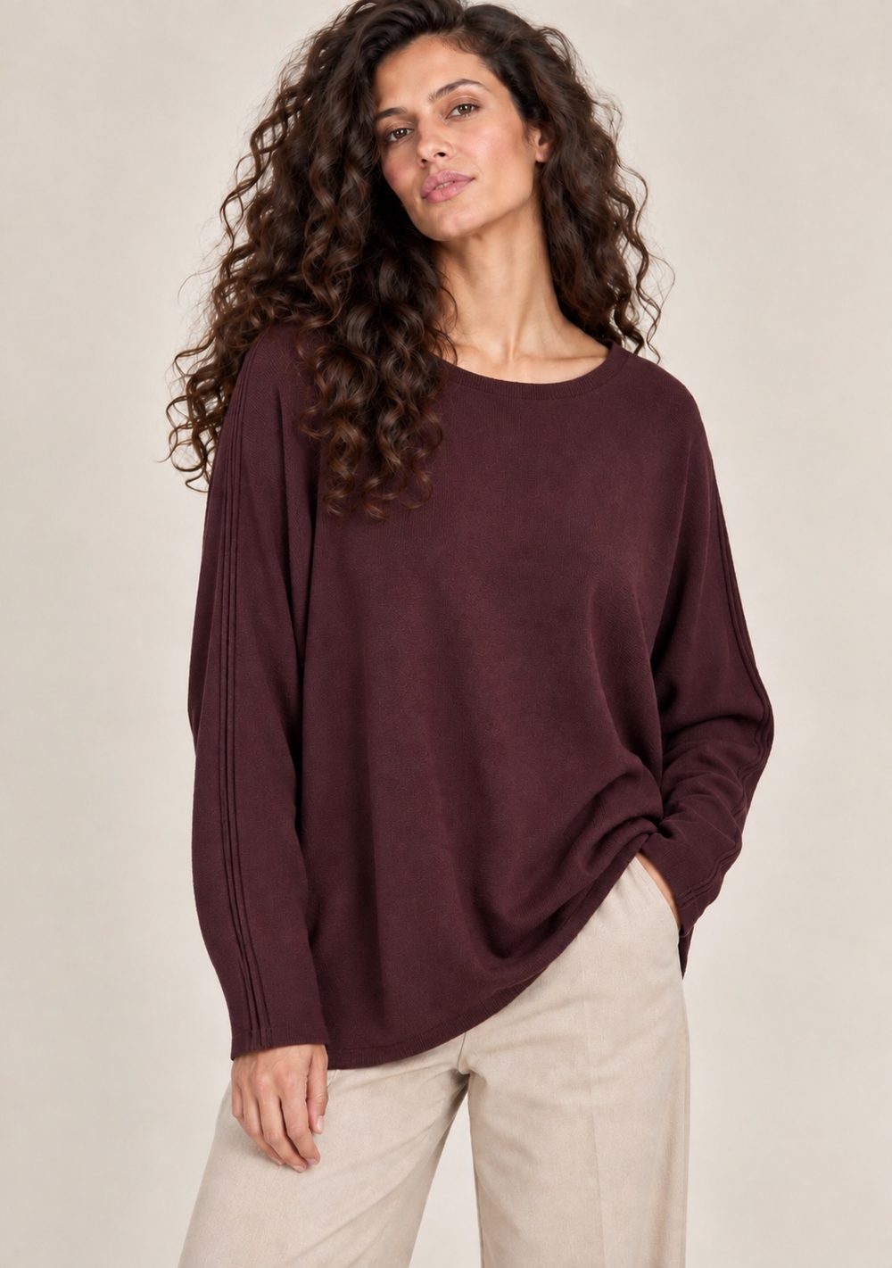 Maglia bottoni dietro in colore bordeaux